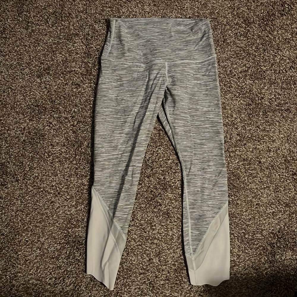 Gray and white Lululemon leggings, size 10, scalloped bottom